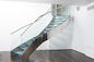 Edelstahl-modernes gebogenes Treppenhaus lamelliertes ausgeglichenes Glas-System